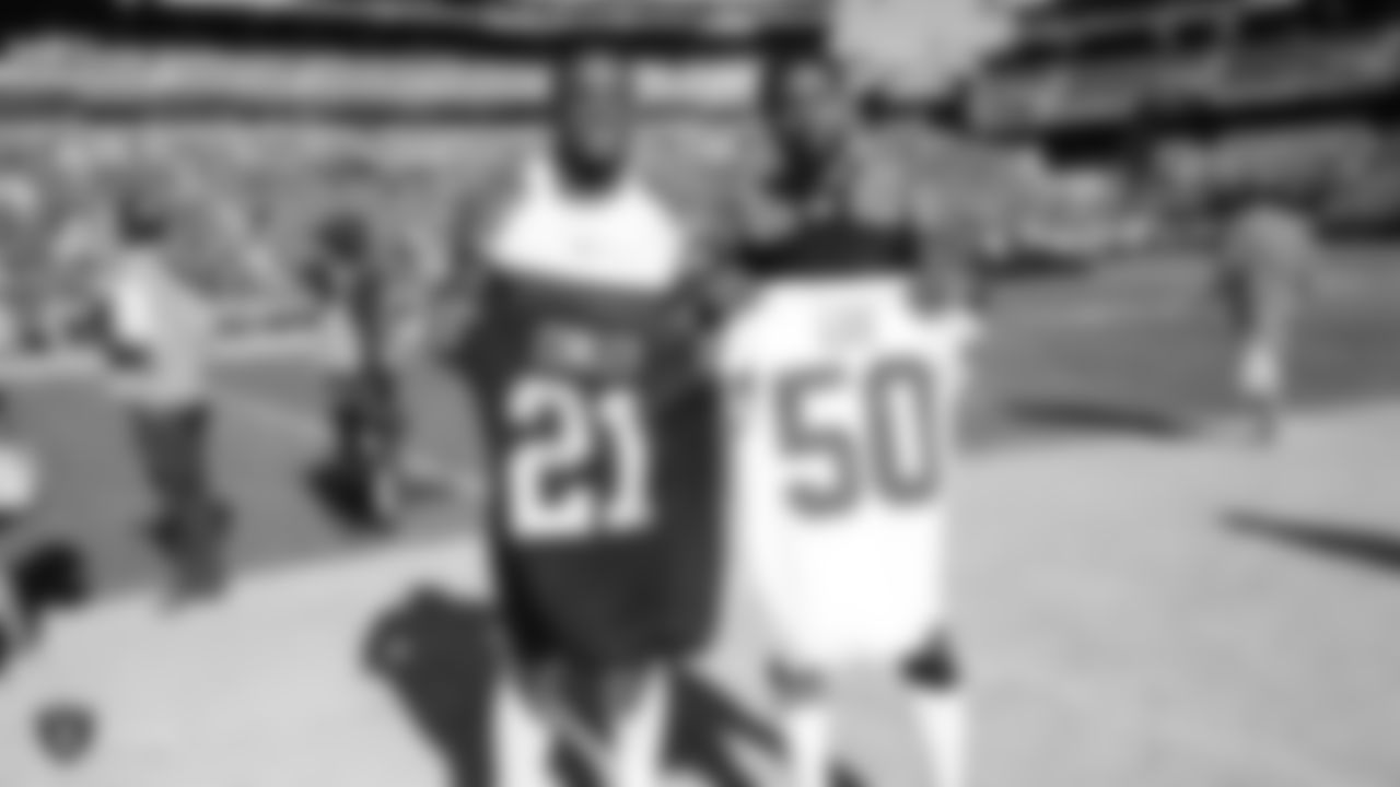 Raiders cornerback Gareon Conley (21) swaps jerseys with Kansas City Chiefs linebacker Darron Lee (50) after the Raiders regular game against the Kansas City Chiefs.