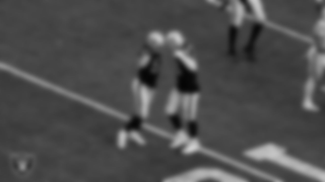 Las Vegas Raiders linebacker Luke Masterson (59) and defensive end Maxx Crosby (98) during the regular season home game against the Indianapolis Colts at Allegiant Stadium.
