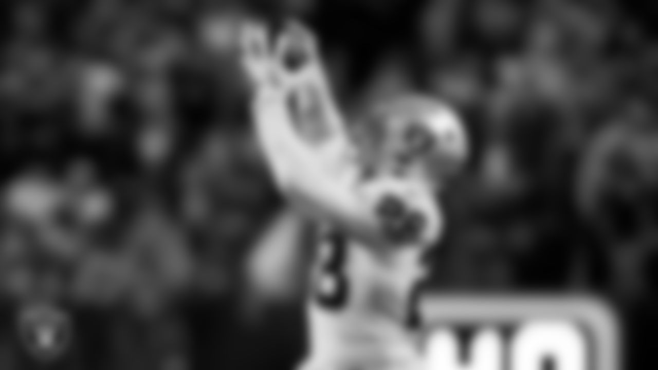 Las Vegas Raiders running back Josh Jacobs (28) makes a catch during the regular season away game against the Denver Broncos at Empower Field at Mile High.