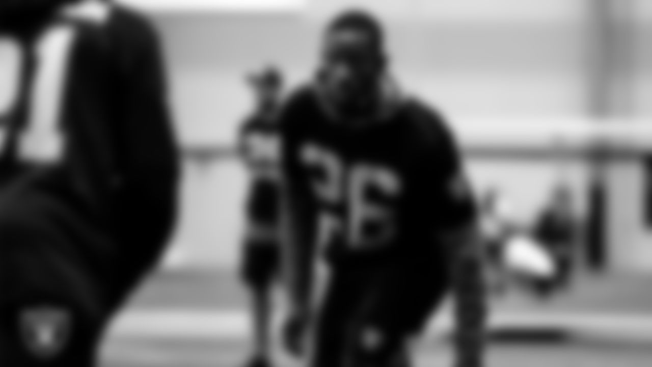 Las Vegas Raiders cornerback Nevin Lawson (26) on the field for a walkthrough.
