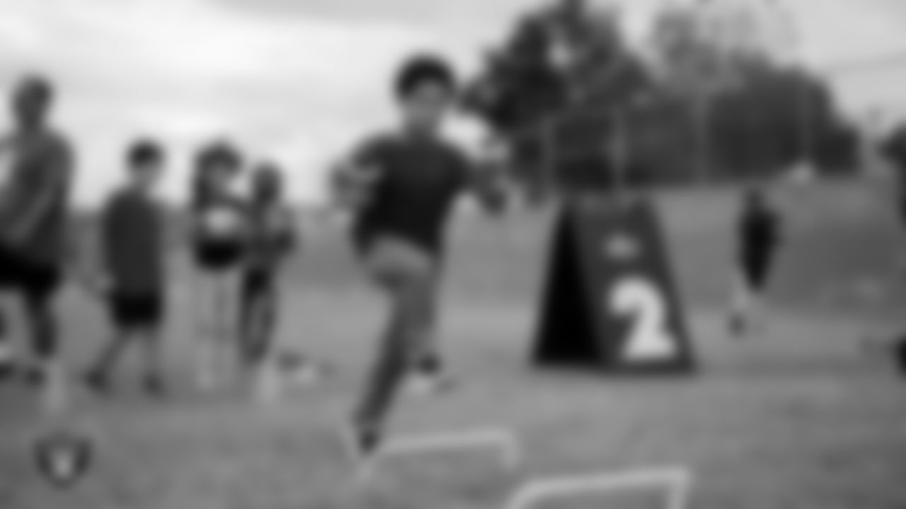 A participant goes through a drill during a Fuel Up to Play 60 football clinic.
