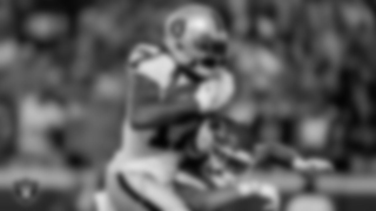 Las Vegas Raiders wide receiver Davante Adams (17) makes a 48-yard touchdown catch during the regular season away game against the Kansas City Chiefs at GEHA Field at Arrowhead Stadium.