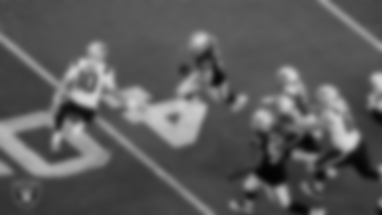Las Vegas Raiders linebacker Luke Masterson (59) returns an interception during the preseason home game against the New England Patriots at Allegiant Stadium.