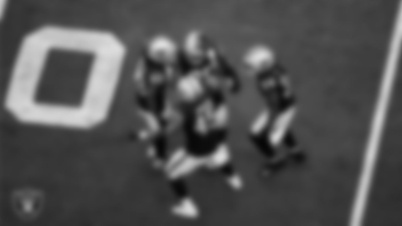 Las Vegas Raiders running back Josh Jacobs (28) celebrates with running back Ameer Abdullah (22), fullback Jakob Johnson (45) and running back Brandon Bolden (34) after rushing for a 10-yard touchdown during the regular season home game against the Denver Broncos at Allegiant Stadium.