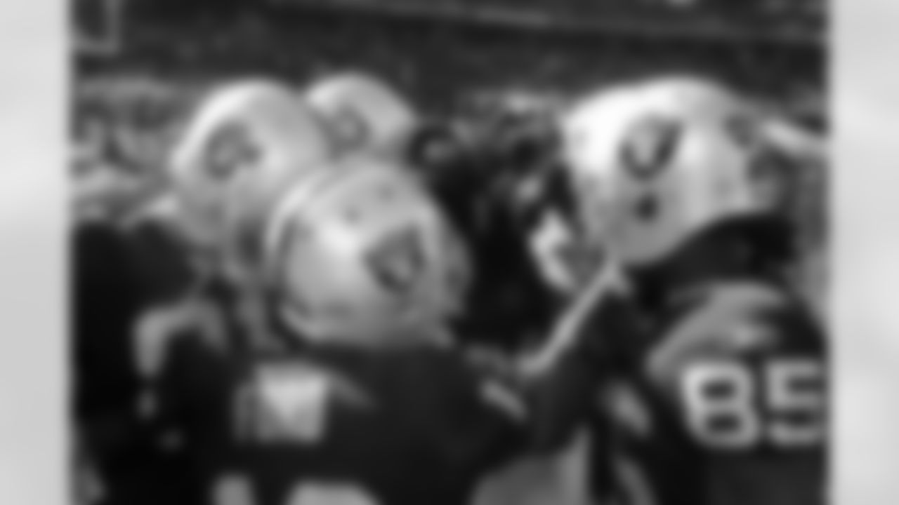 The wide receivers huddle up before taking the field.