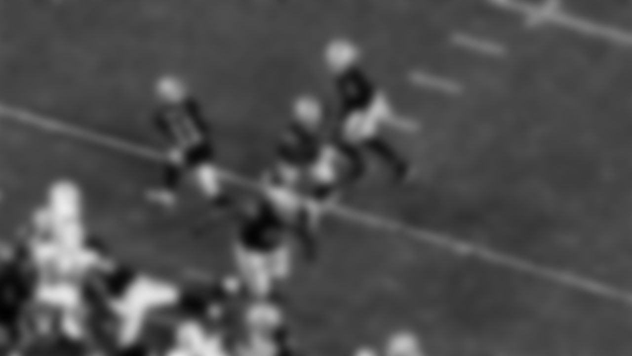 Las Vegas Raiders quarterback Derek Carr (4) hands the ball off to running back Josh Jacobs (28) during the regular season home game against the Miami Dolphins.