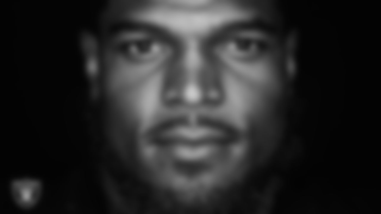 Las Vegas Raiders linebacker Denzel Perryman (52) poses for a photo at the 2022 Las Vegas Raiders Media Day.