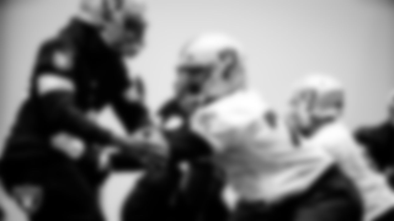 Las Vegas Raiders defensive end Arden Key (99) and tackle Sam Young (70) during practice.