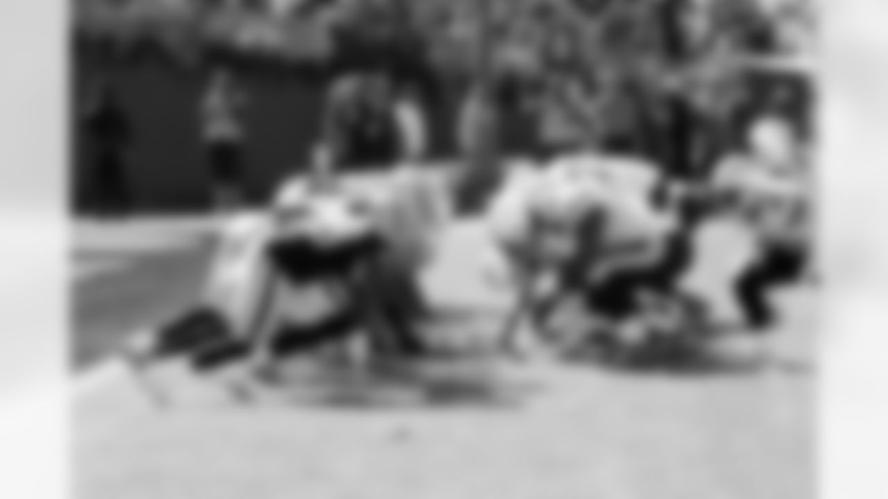 The Raiders line up for the Chargers kick attempt.