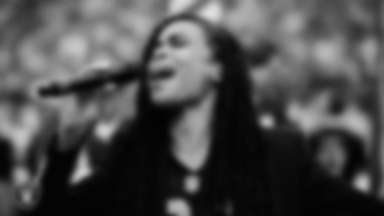 Singer, songwriter and actress Michelle Williams performs the national anthem before the Las Vegas Raiders' regular season home game against the Denver Broncos at Allegiant Stadium.