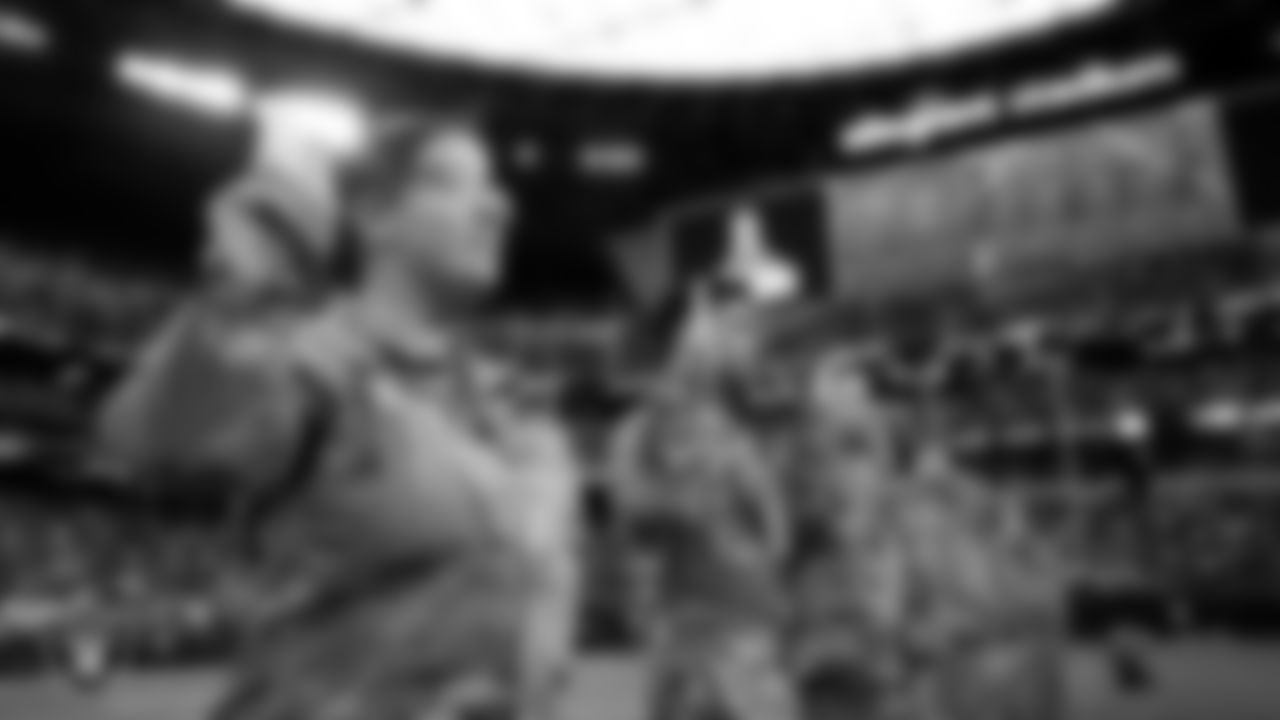 Members of the United States Air Force take part in a reenlistment ceremony before the Las Vegas Raiders' regular season home game against the Cincinnati Bengals.