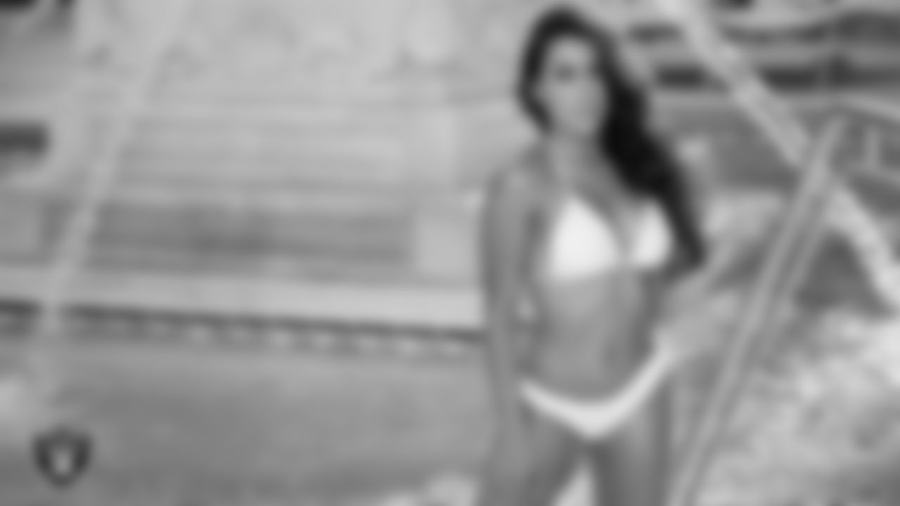 Raiderette Monica G. poses for the 2021 Raiderettes Swimsuit Photoshoot at Bellagio Resort and Casino.