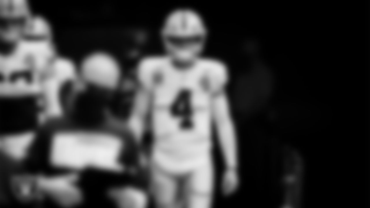 Las Vegas Raiders quarterback Derek Carr (4) walks down the tunnel before the regular season away game against the New England Patriots.