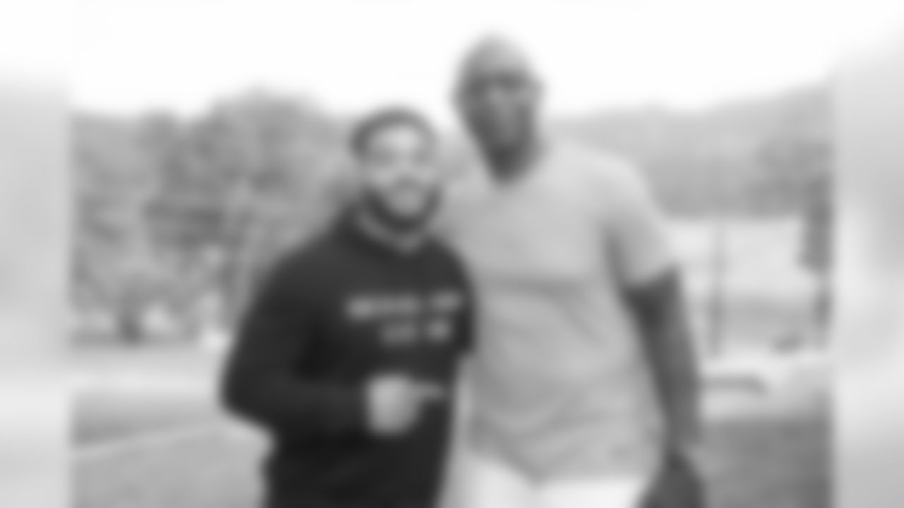 Running back (37) Matt Colburn of the Los Angeles Rams poses with HOF running back Eric Dickerson at a BBQ/Social at Eric Dickerson's home, Tuesday, June 11, 2019, in Calabasas, CA. (Jeff Lewis/Rams)