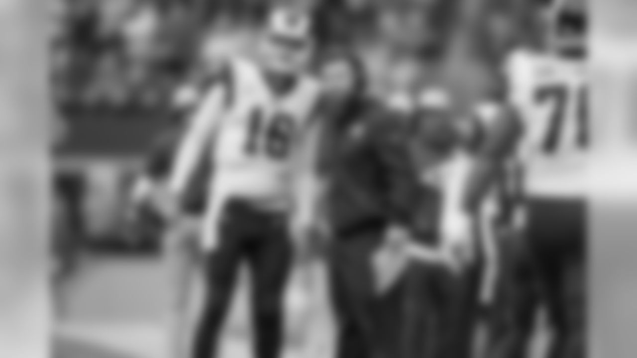 Quarterback (16) Jared Goff of the Los Angeles Rams speaks to head coach Sean McVay while playing against the Seattle Seahawks during the Rams 33-31 victory over the Seahawks in an NFL Week 5 football game at CenturyLink Field, Sunday, October 7, 2018, in Seattle, WA. (Jeff Lewis/Rams)