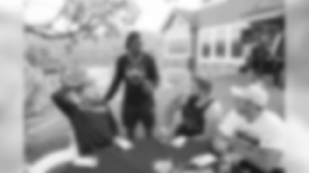 Running back (30) Todd Gurley of the Los Angeles Rams greets rookies at a BBQ/Social at Eric Dickerson's home, Tuesday, June 11, 2019, in Calabasas, CA. (Jeff Lewis/Rams)