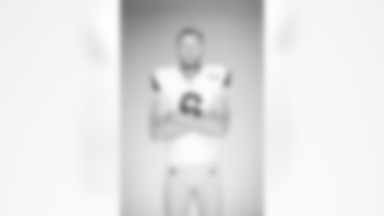Johnny Hekker of the Los Angeles Rams poses in studio on a yellow background, Wednesday, June 2, 2021, in Thousand Oaks, CA. (Jeff Lewis/LA Rams)