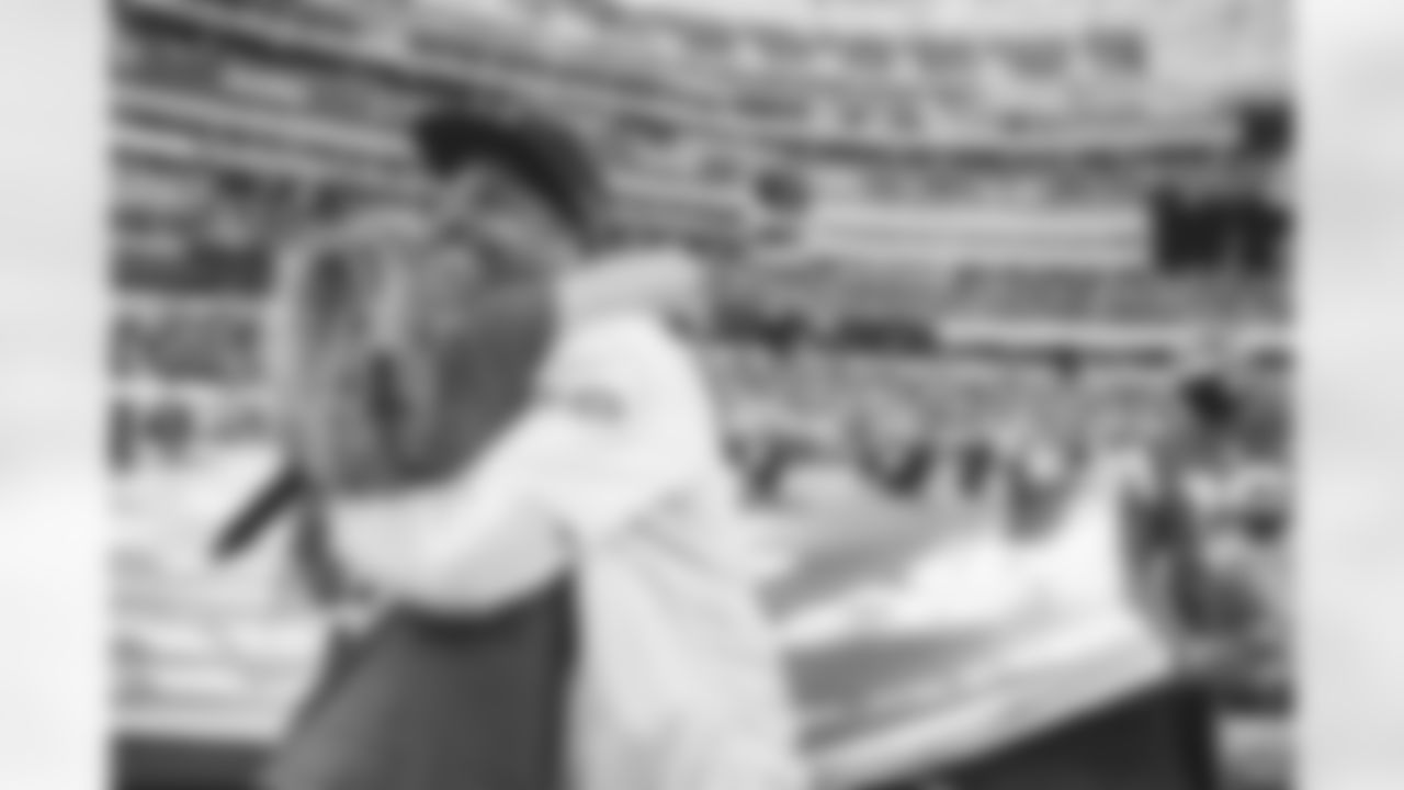 Surprising social justice leaders with Super Bowl tickets during Inspire Change game