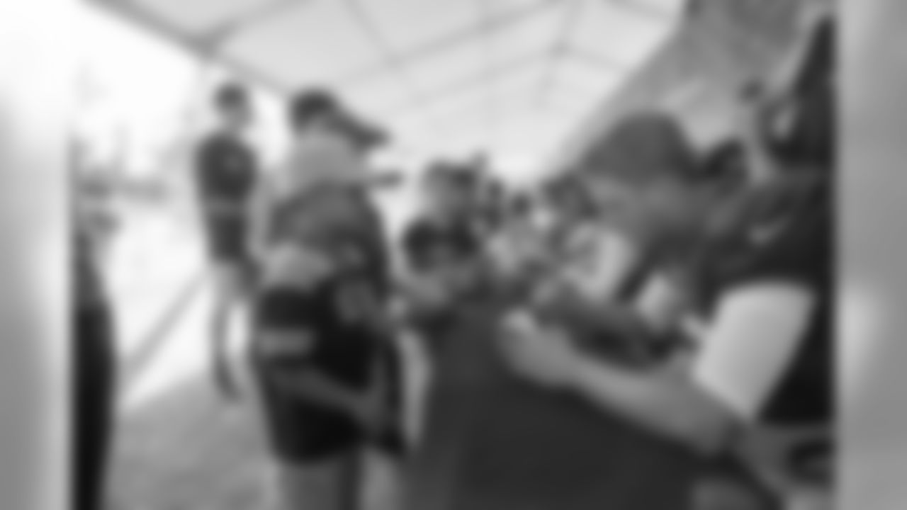Quarterback (16) Jared Goff of the Los Angeles Rams signs autographs after practice on Day 4 of Training Camp, Sunday, July 29, 2018, in Irvine, CA. (Jeff Lewis/Rams)