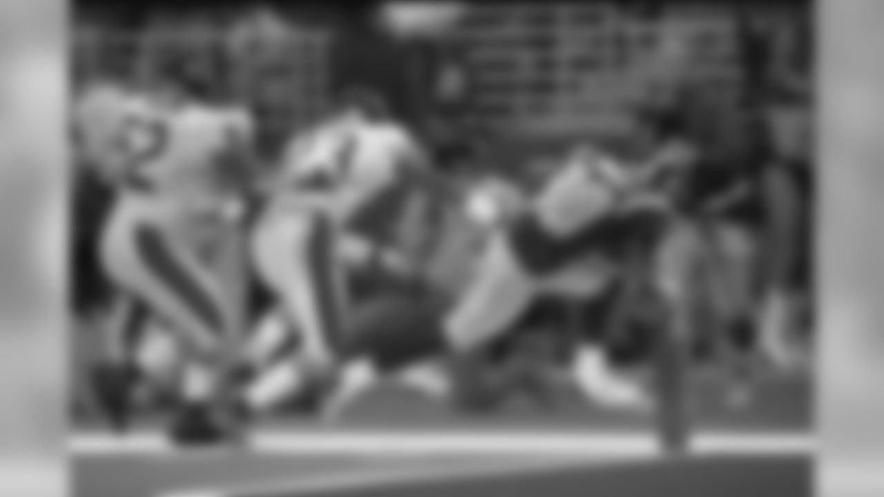 "St. Louis Rams Isaac Bruce scores a touchdown against the Chicago Bears during a game on November 18, 2002 in St. Louis. The Rams won, 21-16. (Photo by Bill Stover/St. Louis Rams)"