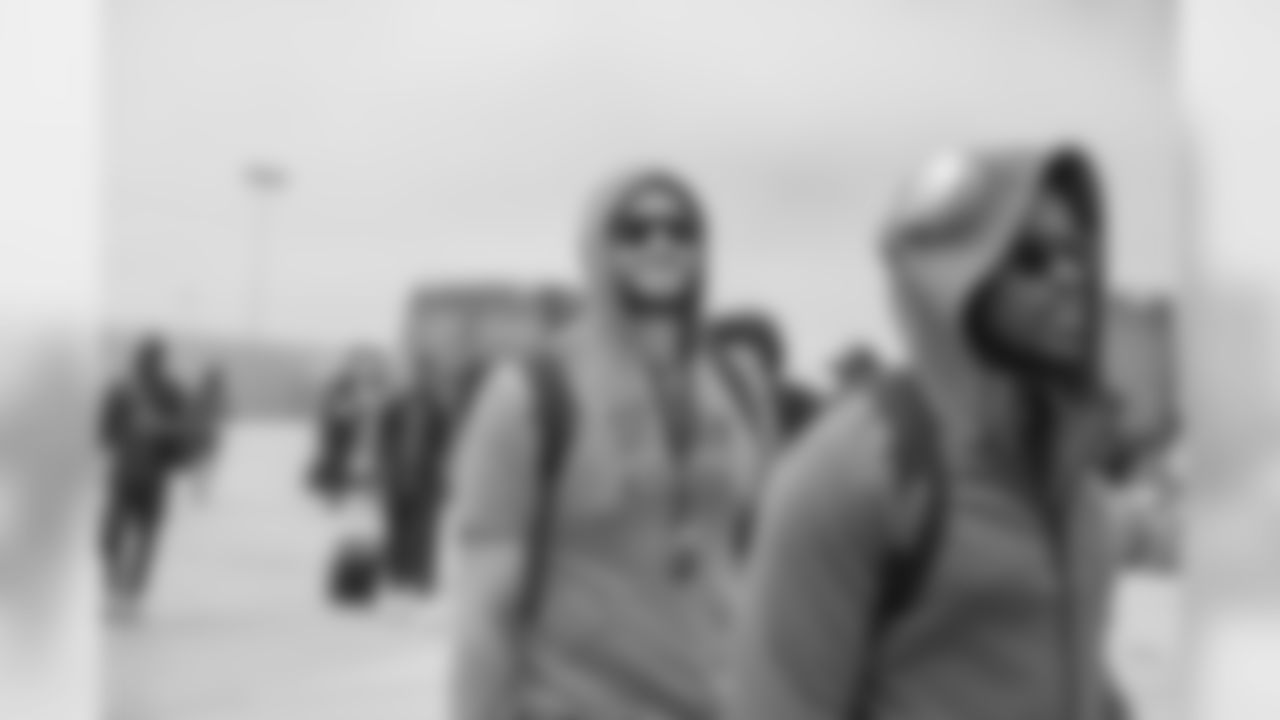 Defensive end (97) Morgan Fox of the Los Angeles Rams arrives at the airport and enters the plane to Oakland, Tuesday, August 6, 2019, in Los Angeles, CA. (Jeff Lewis/Rams)