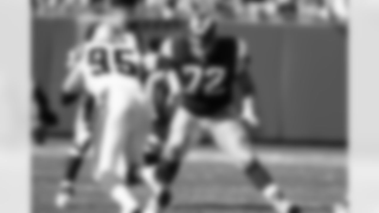 St. Louis Rams guard Zach Wiegert (72) is seen in action during an NFL game against the Carolina Panthers Oct.13, 1996, in Charlotte, N.C. (Allen Kee via AP)