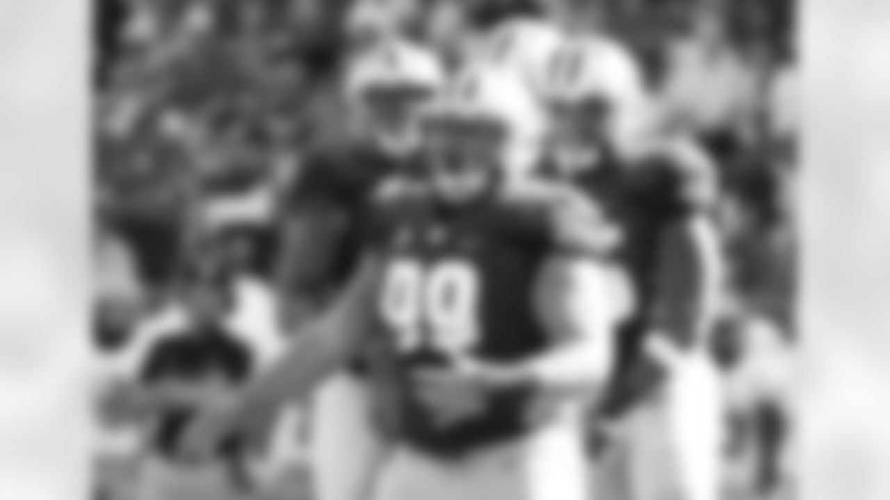 DL Greg Gaines - Washington
Washington defensive lineman Greg Gaines (99) celebrates a sack against Idaho in the first half of an NCAA college football game, Saturday, Sept. 10, 2016, in Seattle.