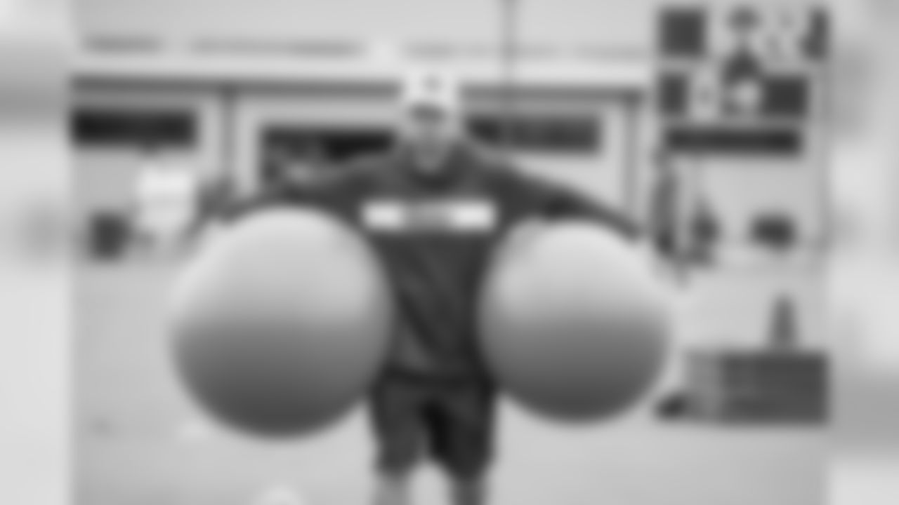 Assistant equipment Luis Ramos of the Los Angeles Rams carries workout balls at practice on day 8 of Phase II of the offseason program workouts, Thursday, May 9, 2019, in Thousand Oaks, CA. (Jeff Lewis/Rams)