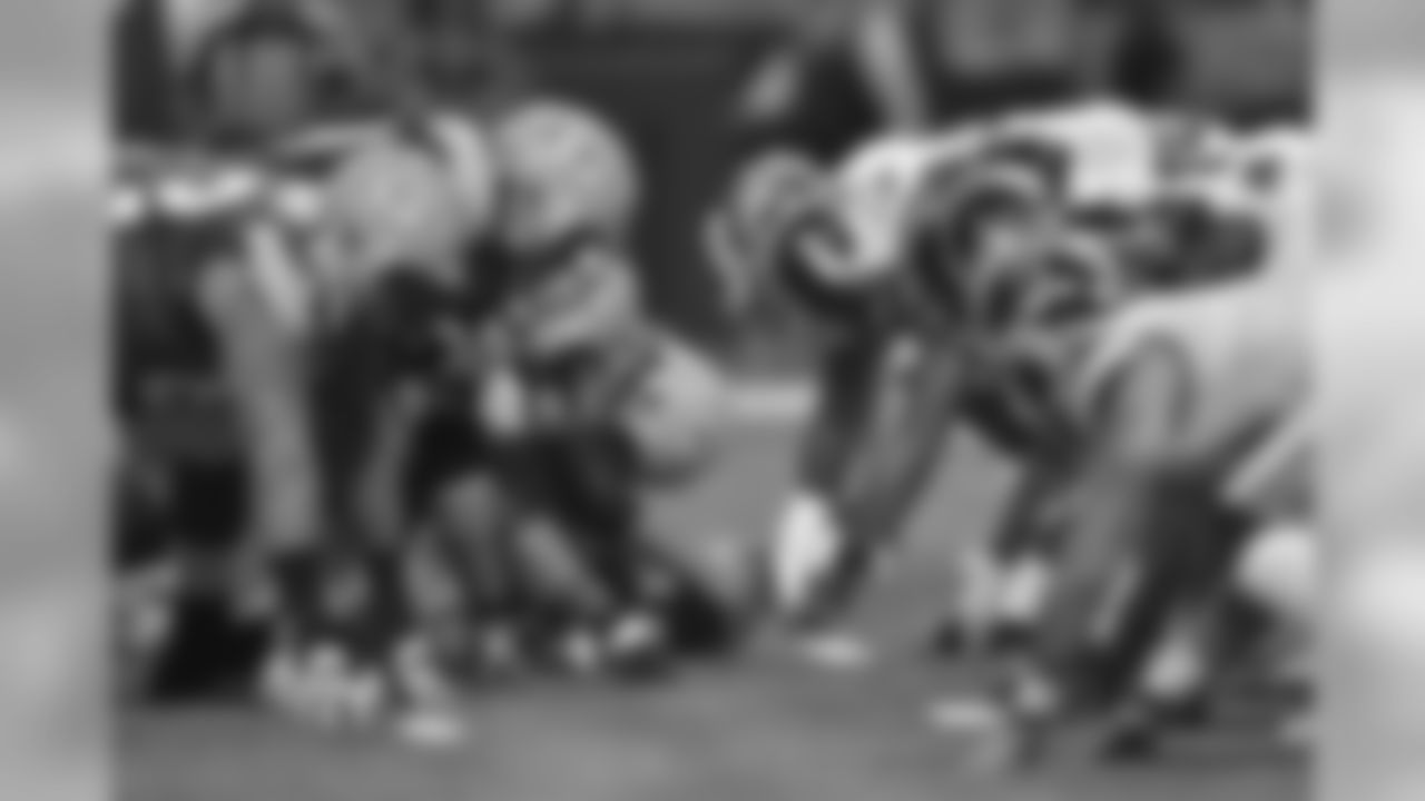 "The Green Bay Packers offense gets set at the line of scrimmage aginast the St. Louis Rams defense during a NFL week 7 football game on Sunday, Oct. 21 in St. Louis. The Packers won the game 30-20. (G. Newman Lowrance/St. Louis Rams)"