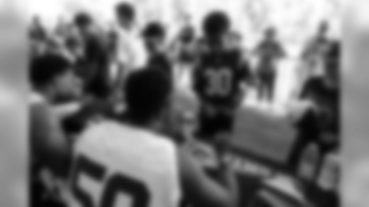 Outside linebacker (50) Samson Ebukam of the Los Angeles Rams signs autographs during Day 1 of Training Camp, Thursday, July 26, 2018, in Irvine, CA. (Will Navarro/Rams)