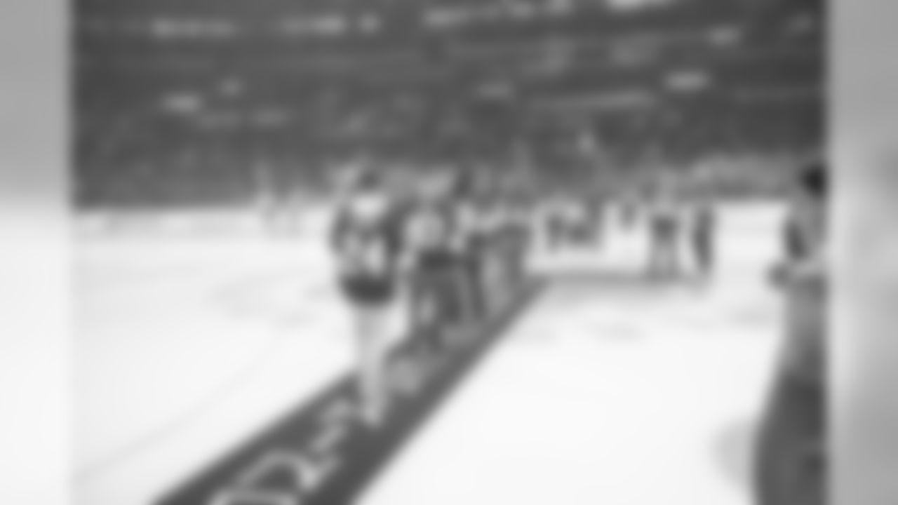 The Los Angeles Rams participate in the dropping of the puck at Rams Night at the Kings, Tuesday, December 10, 2019, in Los Angeles, CA. (Jeff Lewis/Rams)