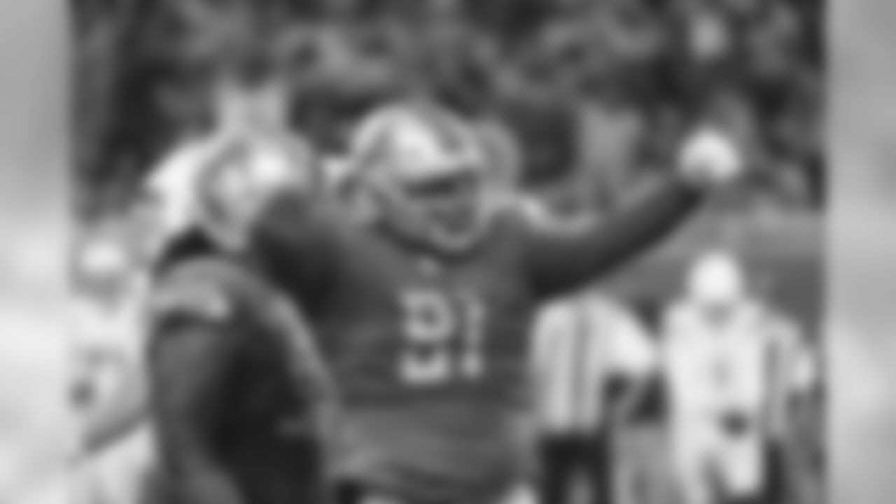 Detroit Lions defensive tackle A'Shawn Robinson (91) celebrates a defensive stop against the Los Angeles Chargers in the first half of an NFL football game in Detroit, Sunday, Sept. 15, 2019. (AP Photo/Rick Osentoski)