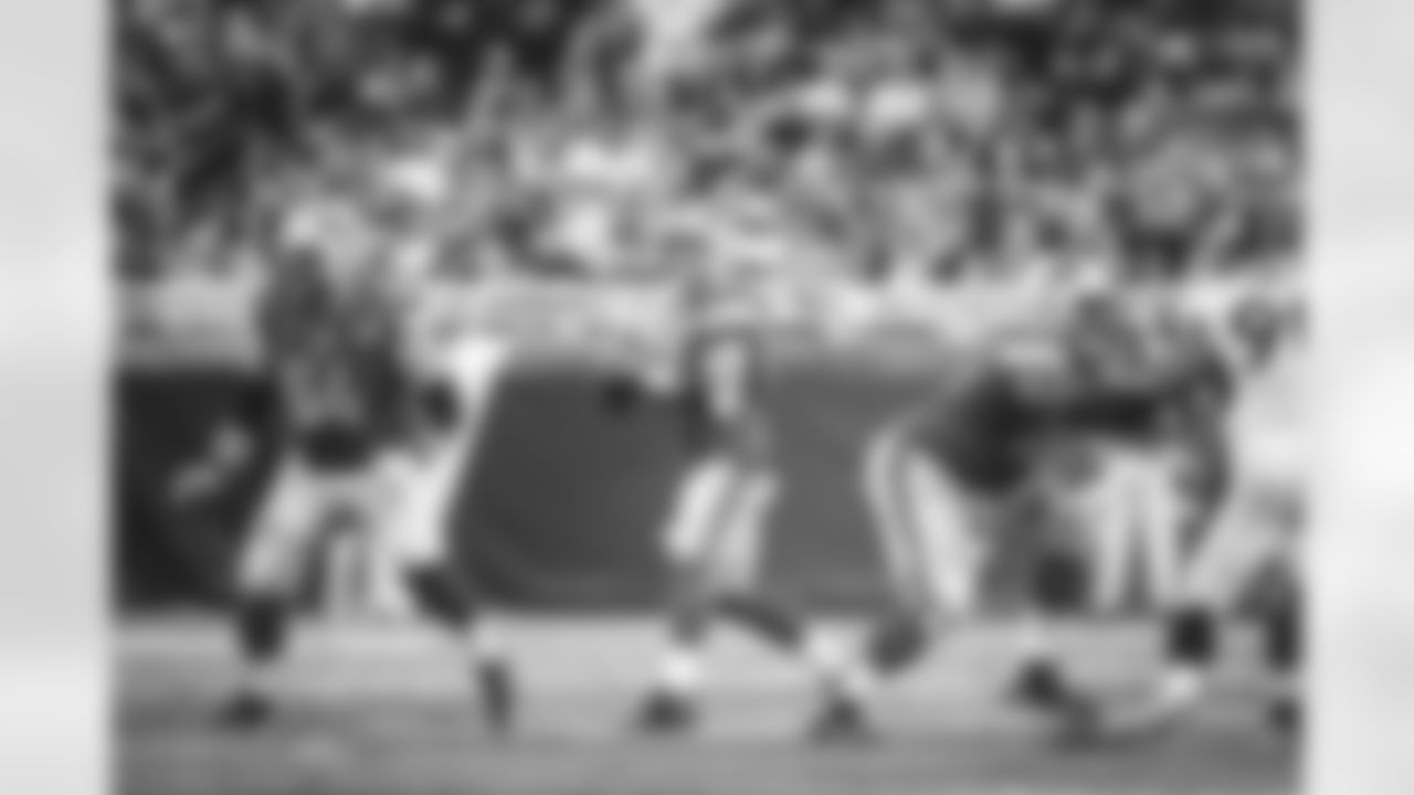 Detroit Lions quarterback Matthew Stafford (9) drops back to pass against the Denver Broncos during an NFL football game at Ford Field in Detroit, Sunday, Sept. 27, 2015. (AP Photo/Rick Osentoski)