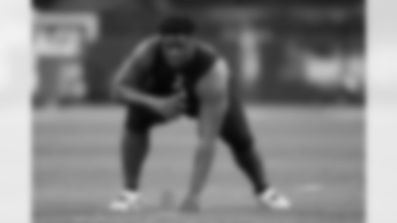 Clemson offensive lineman Tremayne Anchrum runs a drill at the NFL football scouting combine in Indianapolis, Friday, Feb. 28, 2020. (AP Photo/Charlie Neibergall)