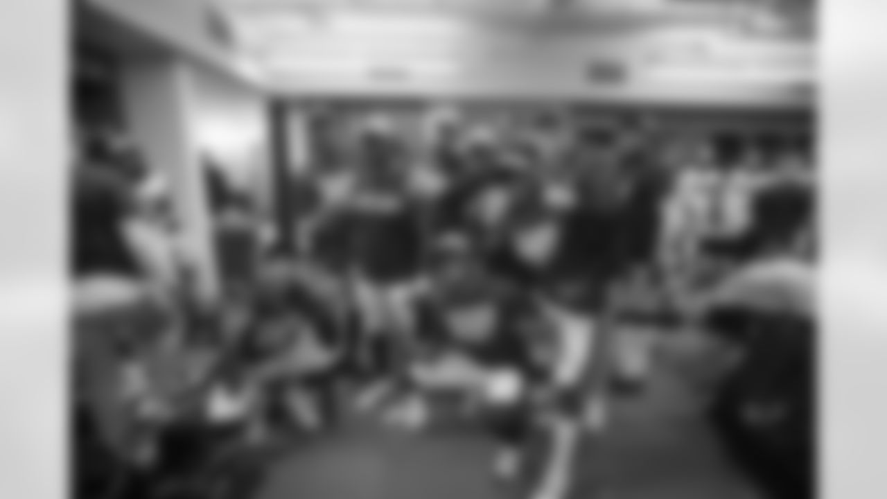 Wide receiver coach Eric Yarber of the Los Angeles Rams poses with (83) Josh Reynolds, (17) Robert Woods, (12) Brandin Cooks, (11) KhaDarel Hodge, (19) JoJo Natson, (10) Pharoh Cooper and assistant code receiver coach Liam Coen in the locker room after the Rams 30-16 victory over the Lions to win the NFC West in a Week 13 NFL football game, Sunday, December 3, 2018, in Detroit, MI. (Jeff Lewis/Rams)