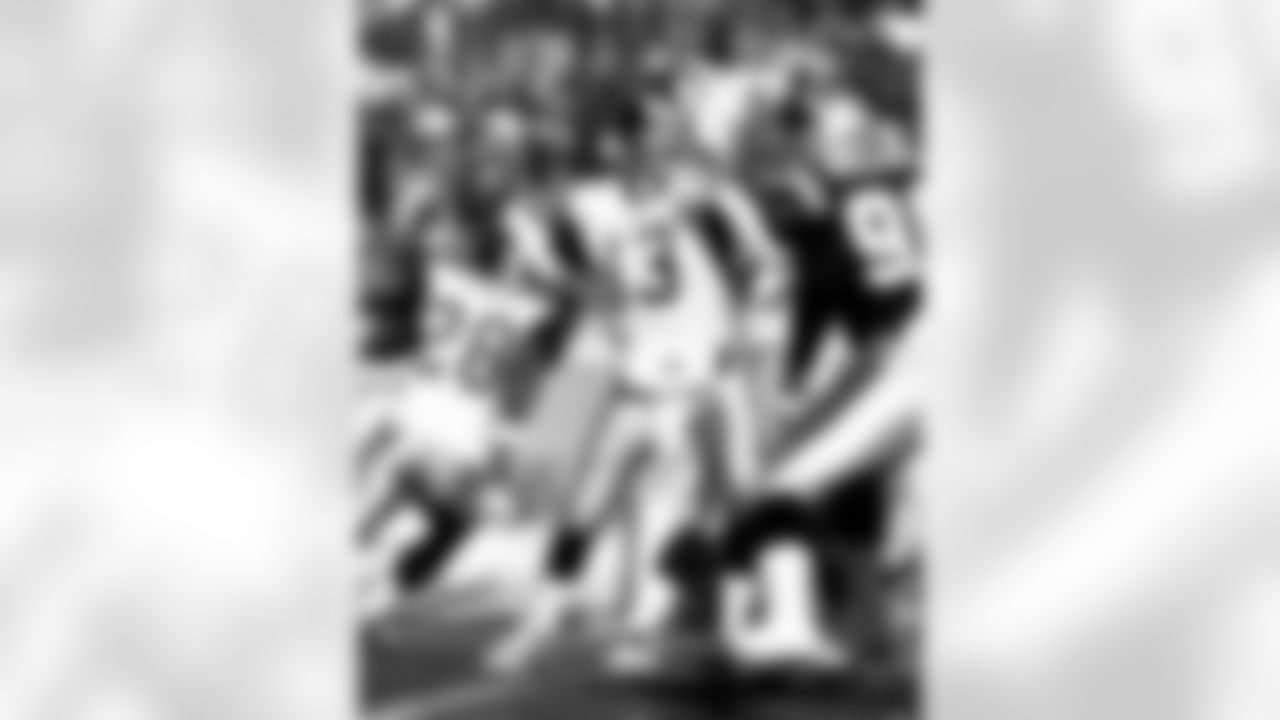 St. Louis Rams quarterback Kurt Warner (13) is seen in action during an NFL game against the Carolina Panthers Dec. 3, 2000, in Charlotte, N.C. (Allen Kee via AP)