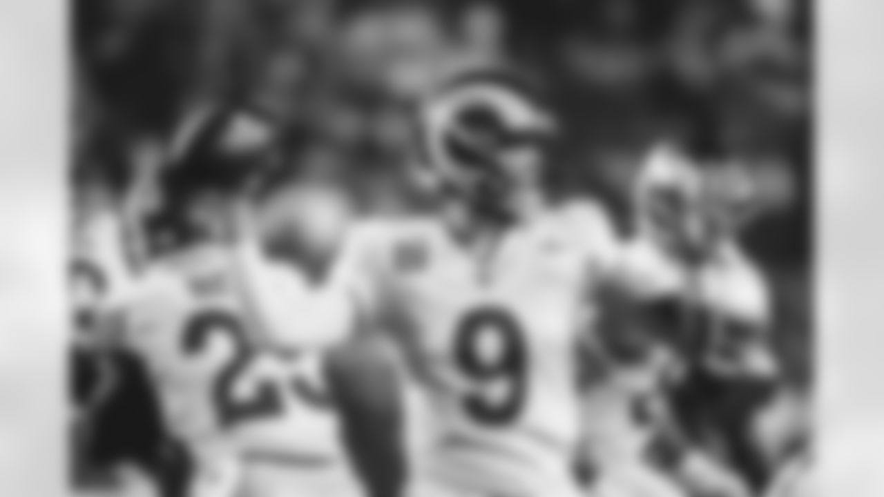 Los Angeles Rams quarterback Matthew Stafford looks to pass against the Arizona Cardinals during the first half of an NFL football game Monday, Dec. 13, 2021, in Glendale, Ariz. (AP Photo/Ralph Freso)