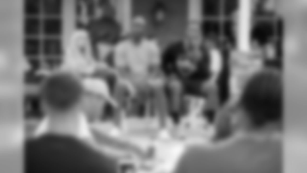 Running back (30) Todd Gurley of the Los Angeles Rams and HOF running back Eric Dickerson speak to the rookies at a BBQ/Social at Eric Dickerson's home, Tuesday, June 11, 2019, in Calabasas, CA. (Jeff Lewis/Rams)
