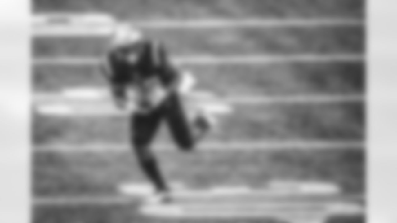 New England Patriots running back Sony Michel (26) runs for yardage during an NFL football game against the New York Jets, Sunday, Jan. 3, 2021 in Foxborough, Mass. The Patriots defeated the Jets 28-14. (Damian Strohmeyer via AP)