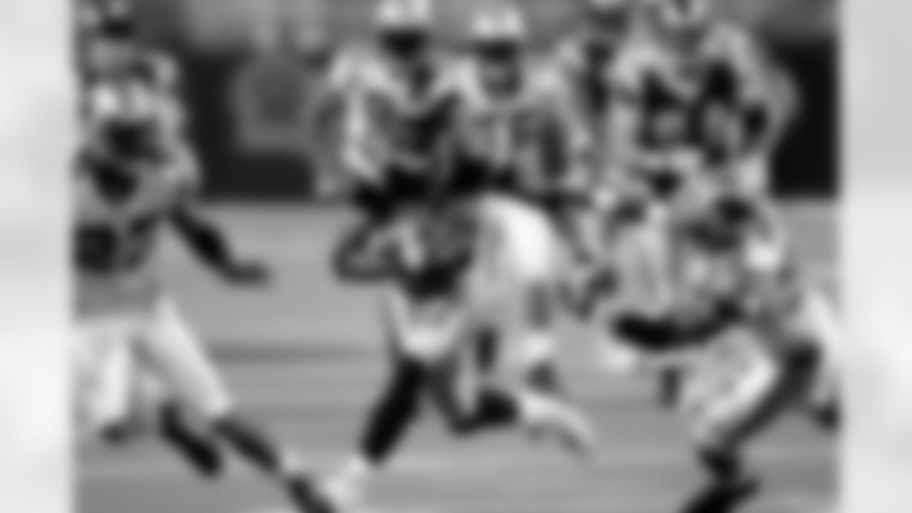 St. Louis Rams wide receiver Isaac Bruce (80) heads upfield during an NFC Divisional Playoff Game against the Carolina Panthers. The Panthers defeated the Rams 29-23 in overtime on January 10, 2004 in St. Louis, Missouri. (AP Photo/Kevin Terrell)