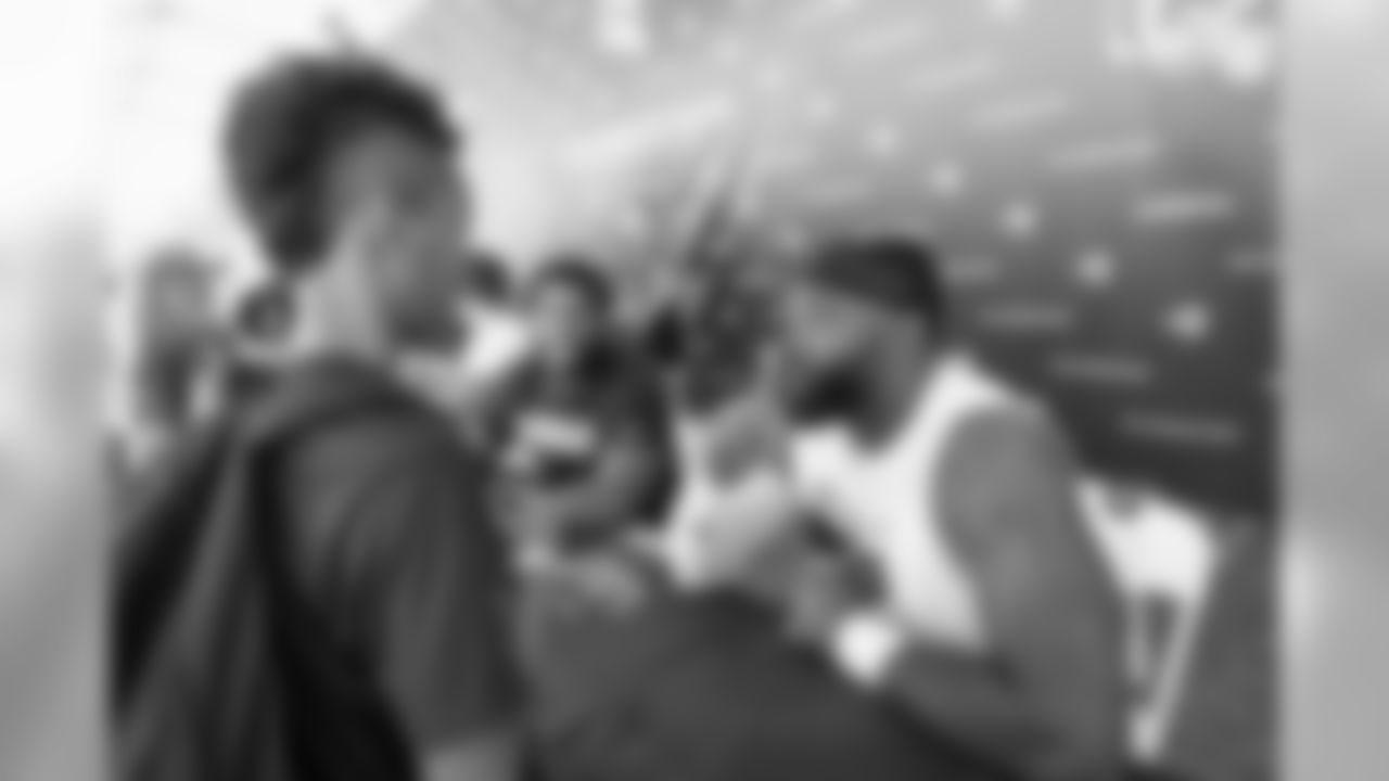 Defensive lineman (90) Michael Brockers of the Los Angeles Rams signs autographs during Day 5 of Training Camp, Monday, July 30, 2018, in Irvine, CA. (Will Navarro/Rams)
