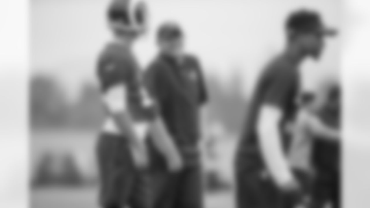 Assistant wide receiver coach Liam Coan of the Los Angeles Rams speaks to Jared Goff during practice on Day 8 of OTA's, Phase 3, Tuesday, June 5, 2018, in Thousand Oaks, CA. (Jeff Lewis/Rams)