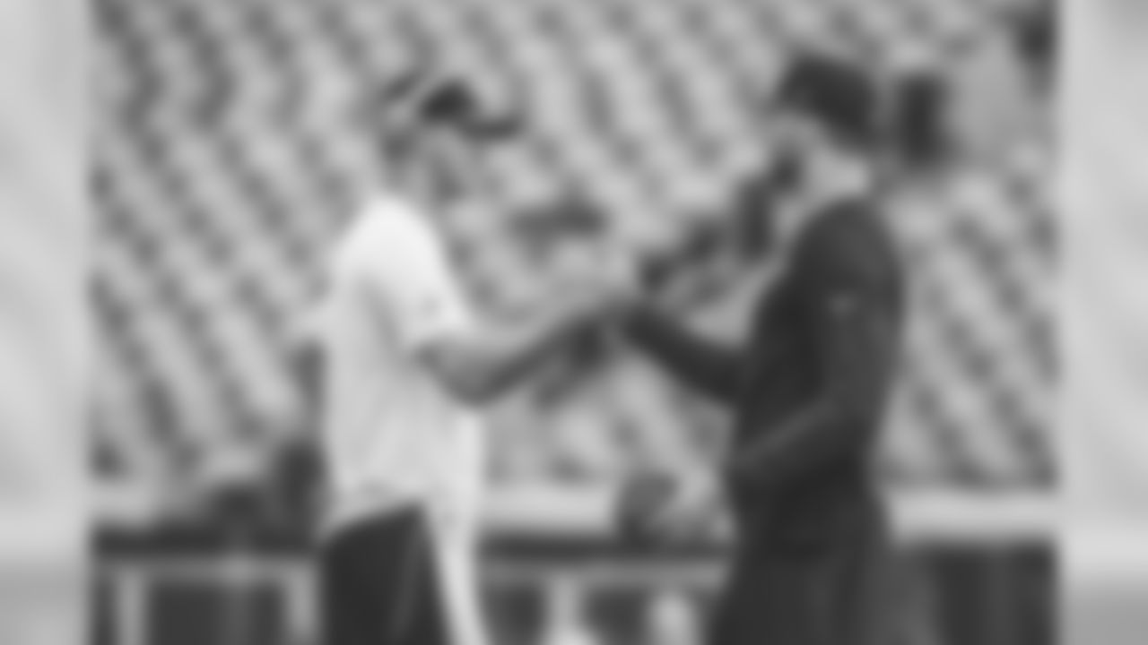Los Angeles Rams quarterback Jared Goff (16) and Jacksonville Jaguars quarterback Blake Bortles (5) shake hands during warm ups prior to an NFL game against the Los Angeles Rams at EverBank Field, Sunday, Oct. 15, 2017, in Jacksonville, Fla. The Rams defeated the Jaguars 27-17. (Perry Knotts via AP)