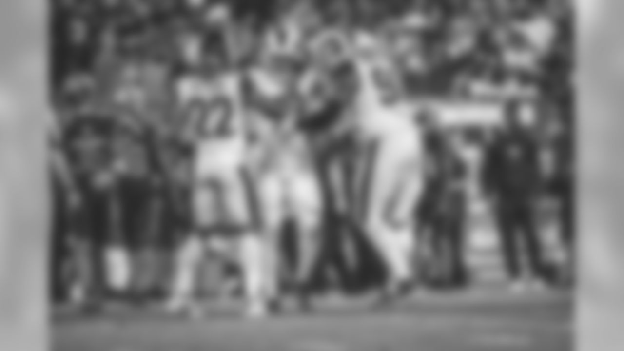 Safety (43) John Johnson III of the Los Angeles Rams intercepts a pass and celebrates with (22) Marcus Peters and (90) Michael Brockers against the Cleveland Browns during the Rams 20-13 victory over the Browns in an NFL Week 3 football game, Sunday, September 22, 2019, in Cleveland, OH. (Jeff Lewis/Rams)