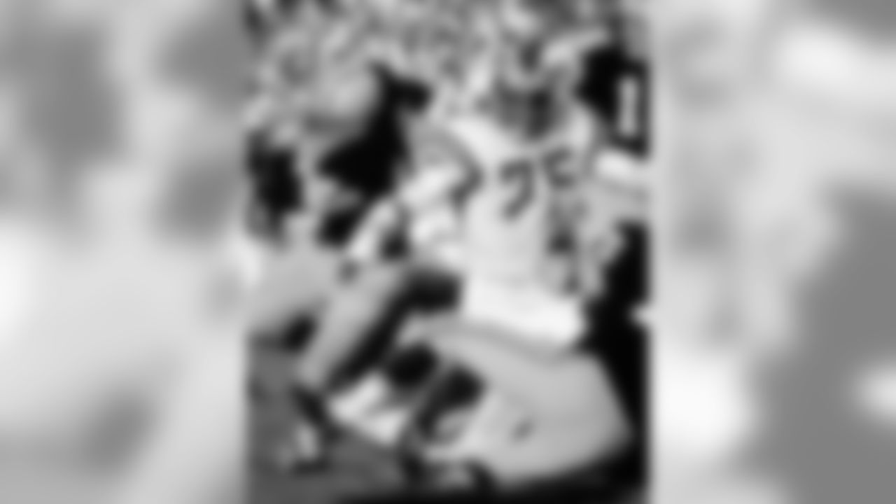 1963 | Hall of Fame DE David "Deacon" Jones (75)