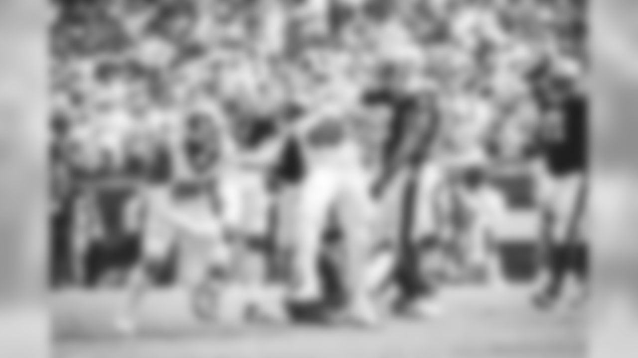 Defensive lineman (90) Michael Brockers and Defensive tackle (99) Aaron Donald of the Los Angeles Rams make a tackle against the New Orleans Saints during the Rams 27-9 victory over the Saints in a Week 2 NFL football game, Sunday, September 15, 2019, in Los Angeles, CA. (Will Navarro/Rams)