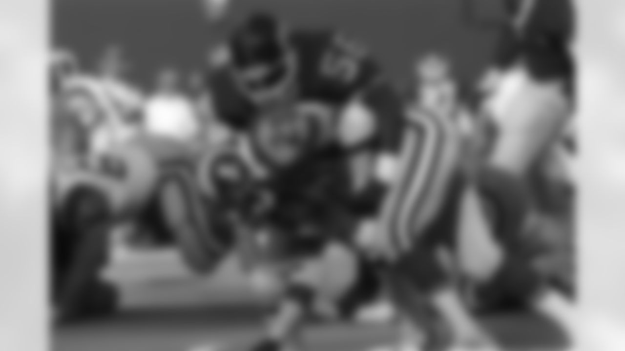 2023 Season Schedule: Week 17: Los Angeles Rams at New York Giants | Sun, Dec. 31 @ 10:00 a.m. PT at MetLife Stadium
Throwback: New York Giants linebacker Lawrence Taylor (56) tackles Los Angeles Rams running back Eric Dickerson during game at Giants Stadium in East Rutherford, N.J., on Nov. 10, 1985. (AP Photo)