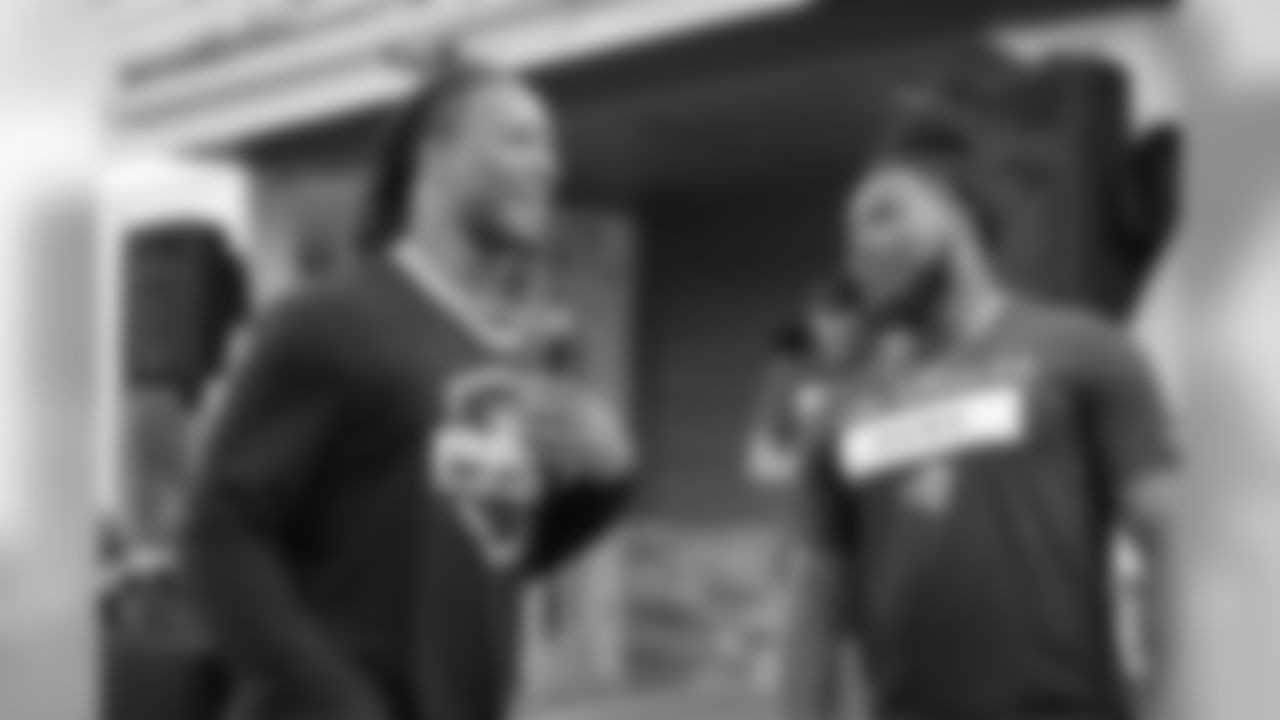 Running back (30) Todd Gurley of the Los Angeles Rams speaks to teammate (27) Darrell Henderson at a BBQ/Social at Eric Dickerson's home, Tuesday, June 11, 2019, in Calabasas, CA. (Jeff Lewis/Rams)