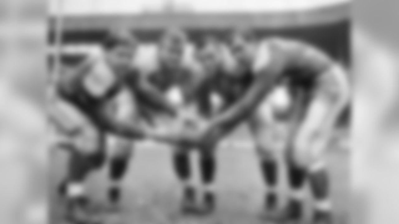 1941 | Cleveland Rams players are seen at the Polo Grounds in New York. From left to right: Corby Davis, Rudy Mucha, Johnny Drake and Parker Hall.