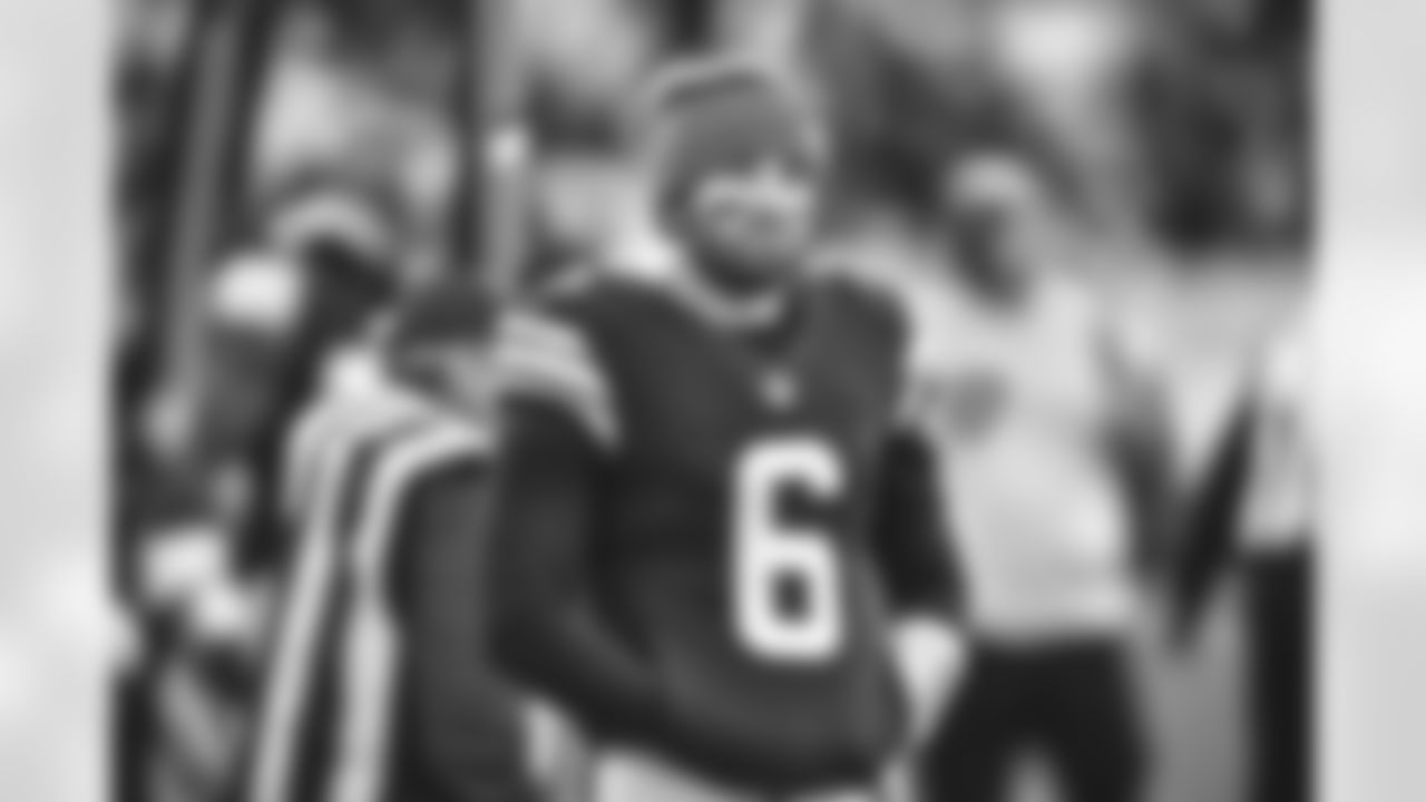 FILE - Cleveland Browns quarterback Baker Mayfield stands on the sideline during an NFL football game against the Baltimore Ravens, Sunday, Dec. 12, 2021, in Cleveland. With Deshaun Watson due to arrive any day to take over as Cleveland's franchise QB, Mayfield, who requested a trade last week after feeling betrayed by the Browns, is leaving. When and where he's going is still to be determined. (AP Photo/David Richard, File)
